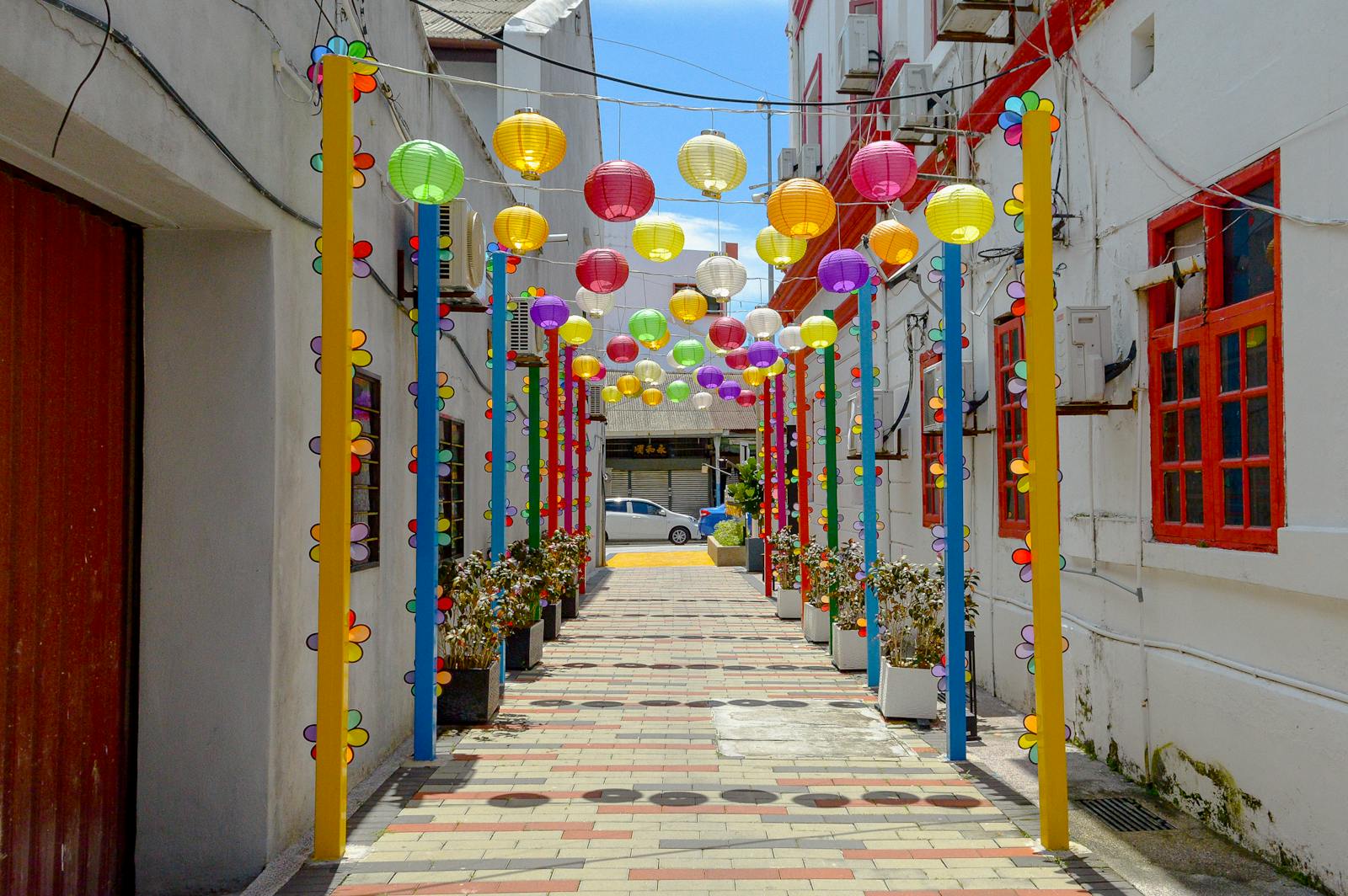 Lanterns Hanging over Alley in Town