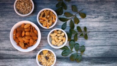 Assorted Nuts in White Ceramic Bowls