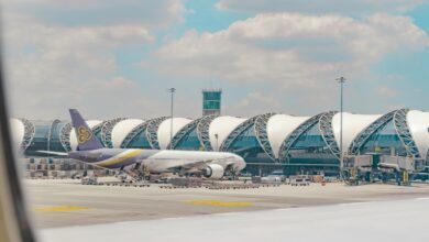 a large jetliner sitting on top of an airport tarmac