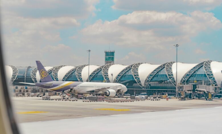 a large jetliner sitting on top of an airport tarmac