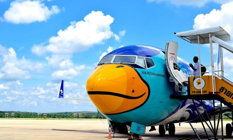 an airplane with a smiley face painted on the side