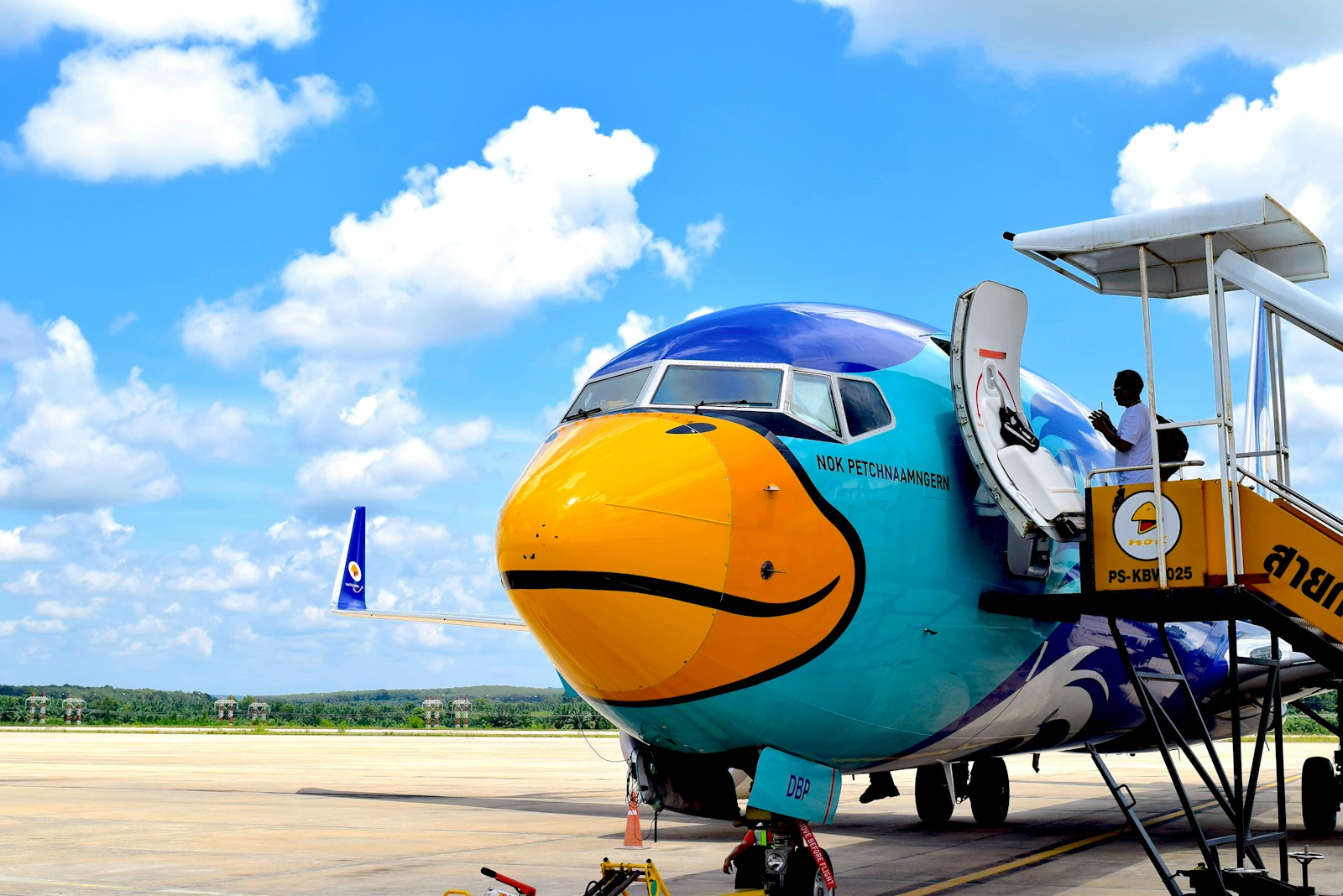 an airplane with a smiley face painted on the side