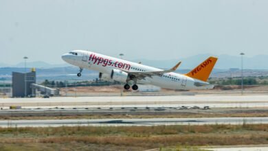 a large jetliner taking off from an airport runway