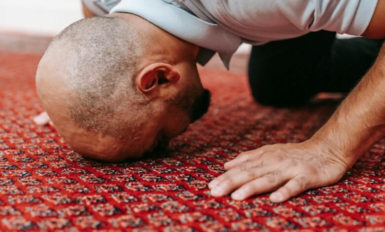 A Man Praying on the Floor