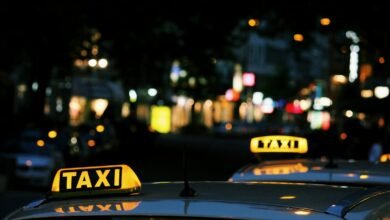 shallow focus photography of Taxi signage