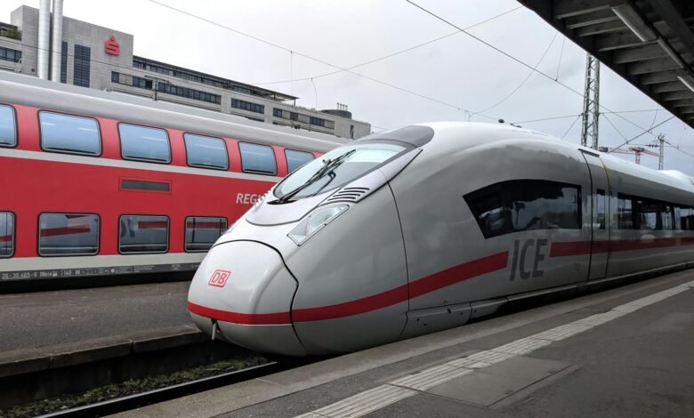 High-speed ICE and regional trains at Stuttgart station in Germany.