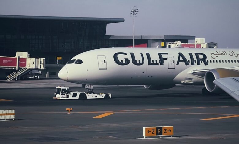 A large jetliner sitting on top of an airport tarmac