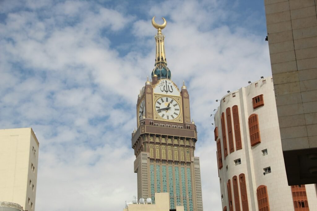 A tall clock tower towering over a city