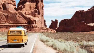 yellow Volkswagen van on road