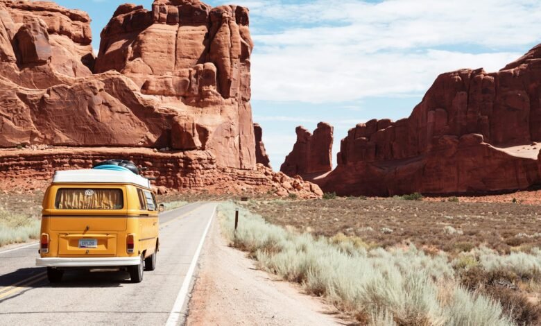 yellow Volkswagen van on road