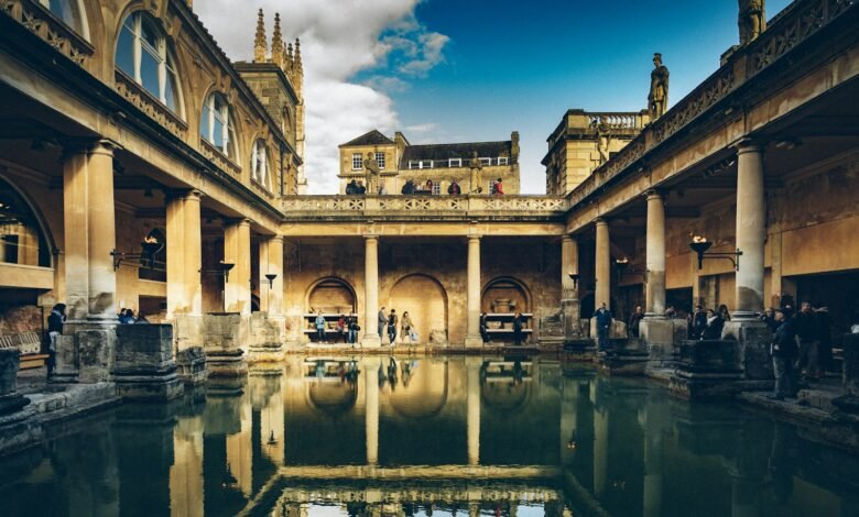 a large building with a pool in the middle of it