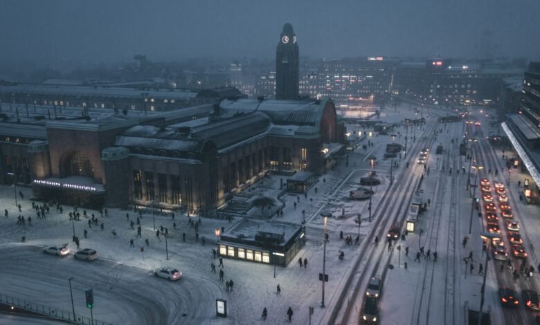 aerial photography of street at night covered with snow