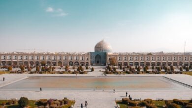 Explore the majestic Naqsh-e Jahan Square in Isfahan with its beautiful architecture and vibrant atmosphere.