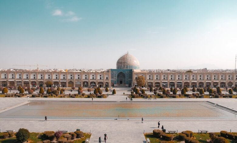 Explore the majestic Naqsh-e Jahan Square in Isfahan with its beautiful architecture and vibrant atmosphere.