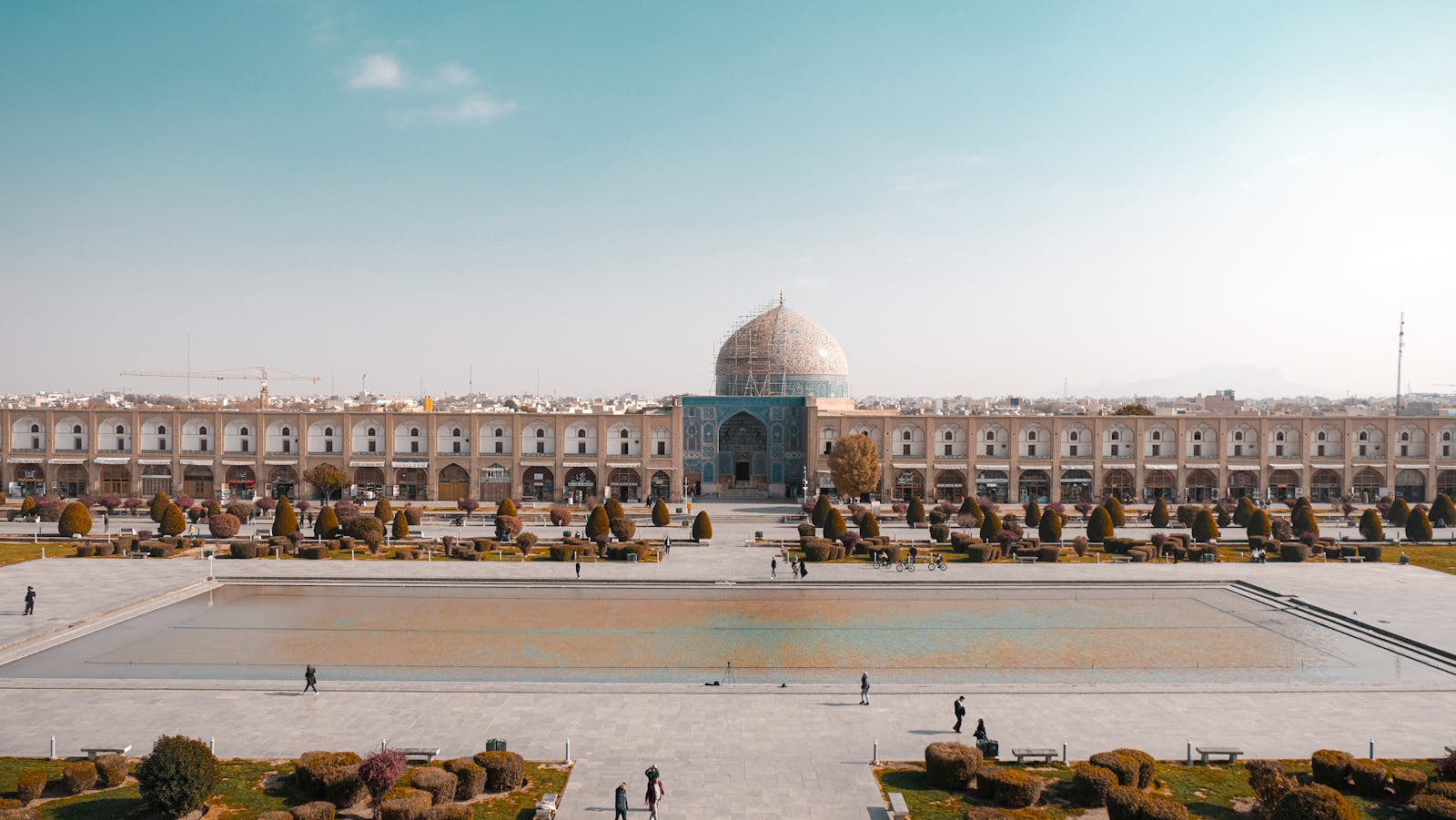 Explore the majestic Naqsh-e Jahan Square in Isfahan with its beautiful architecture and vibrant atmosphere.