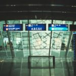 a glass building with signs