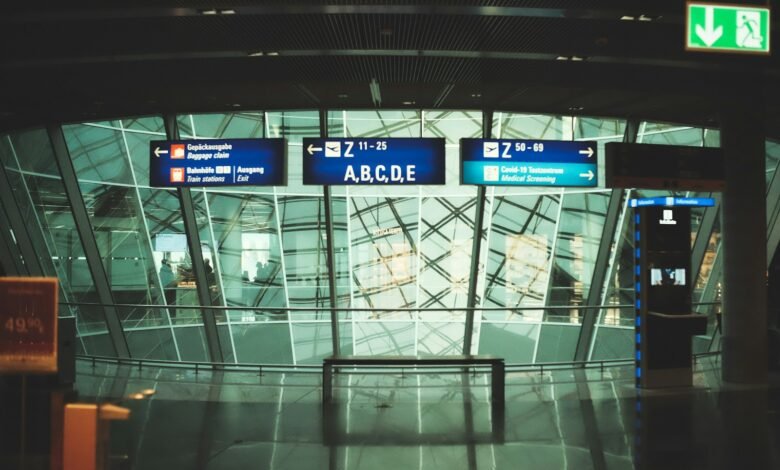 a glass building with signs
