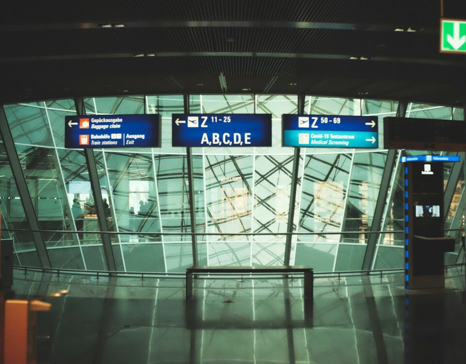 a glass building with signs